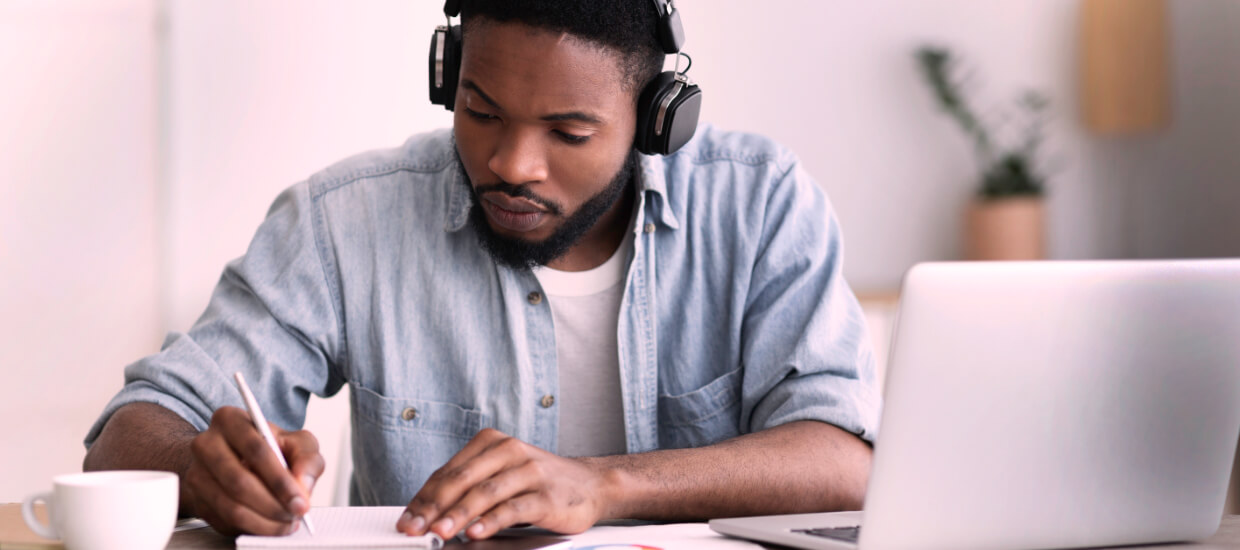 Photo: A man taking an online course